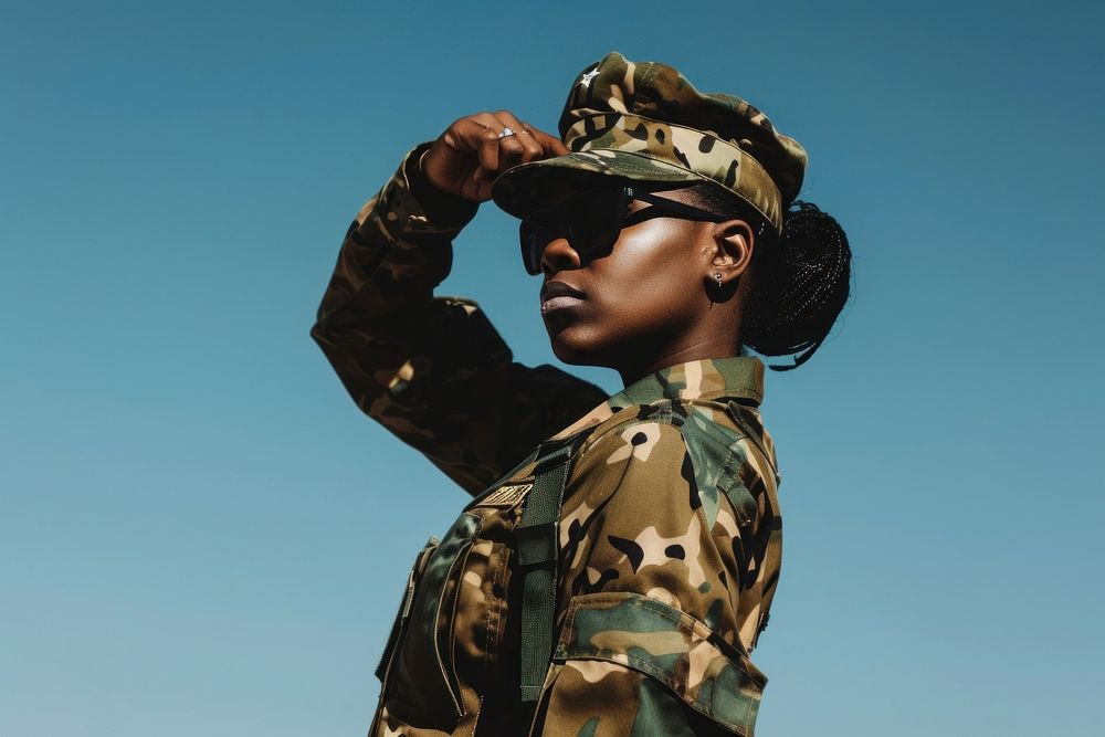 Black female in military outfit soldier army sunglasses.