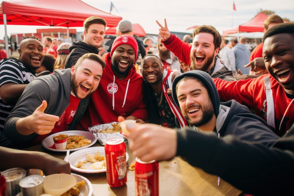 Fans tailgating outside a stadium adult fun togetherness.