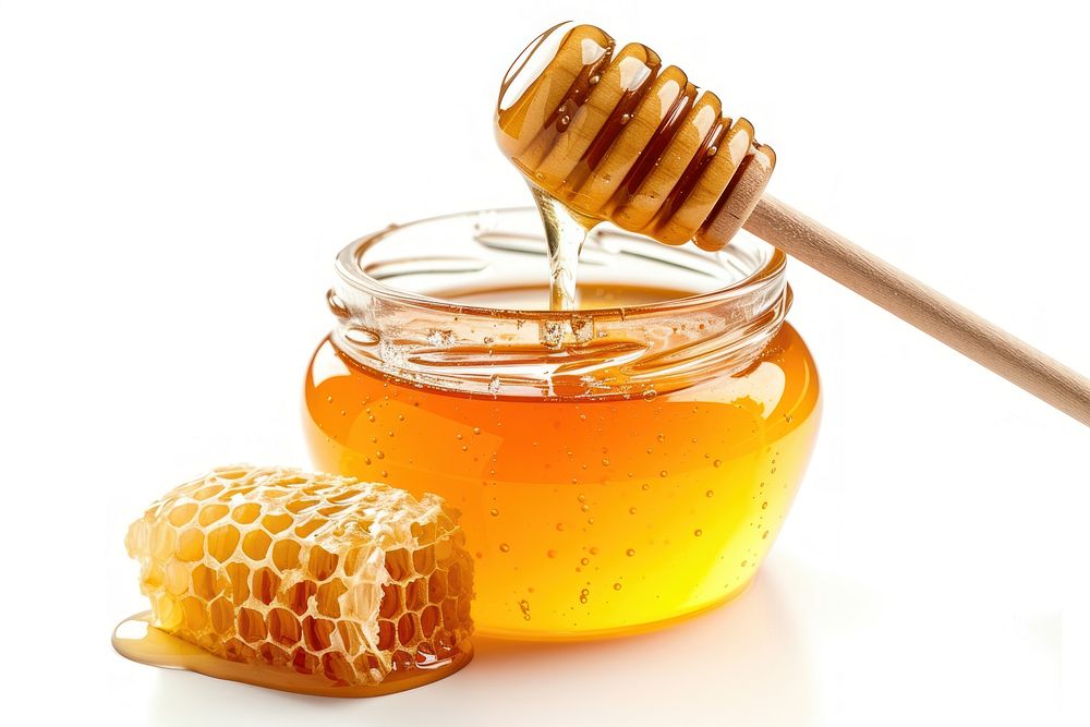 Photo of honey honeycomb food white background.