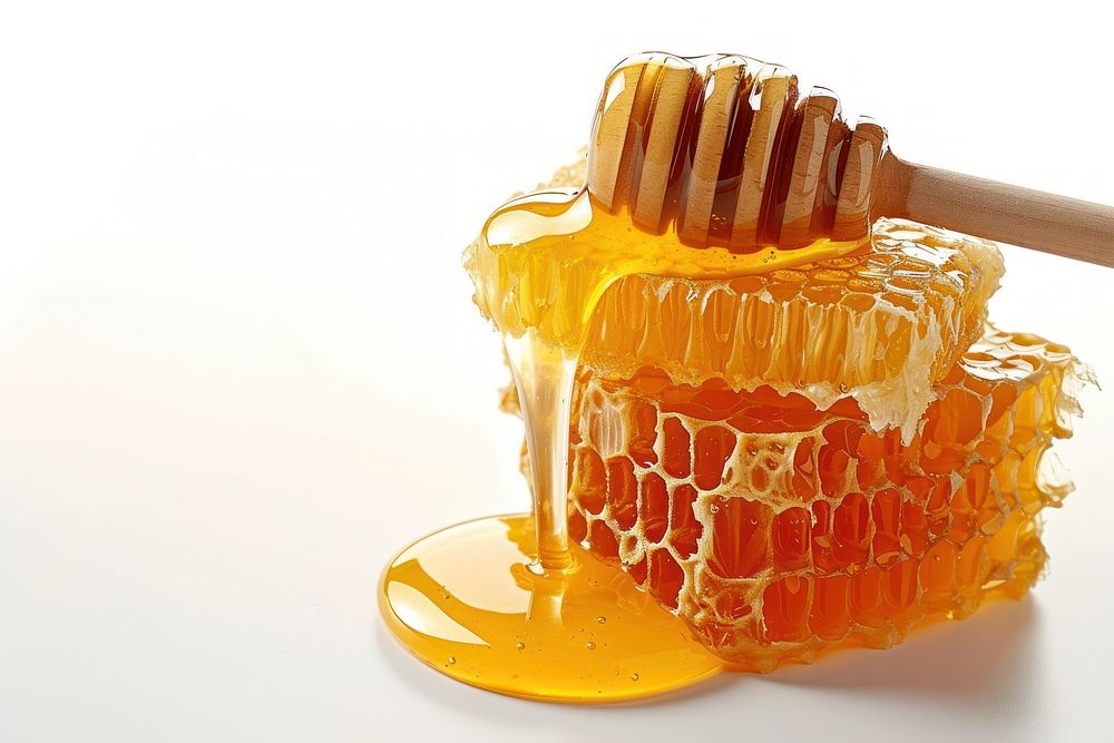 Photo of honey honeycomb white background freshness.