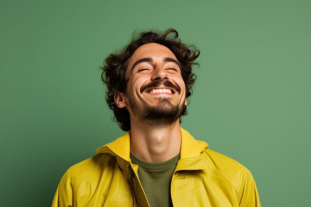 Hand touching on forehead laughing portrait smiling.