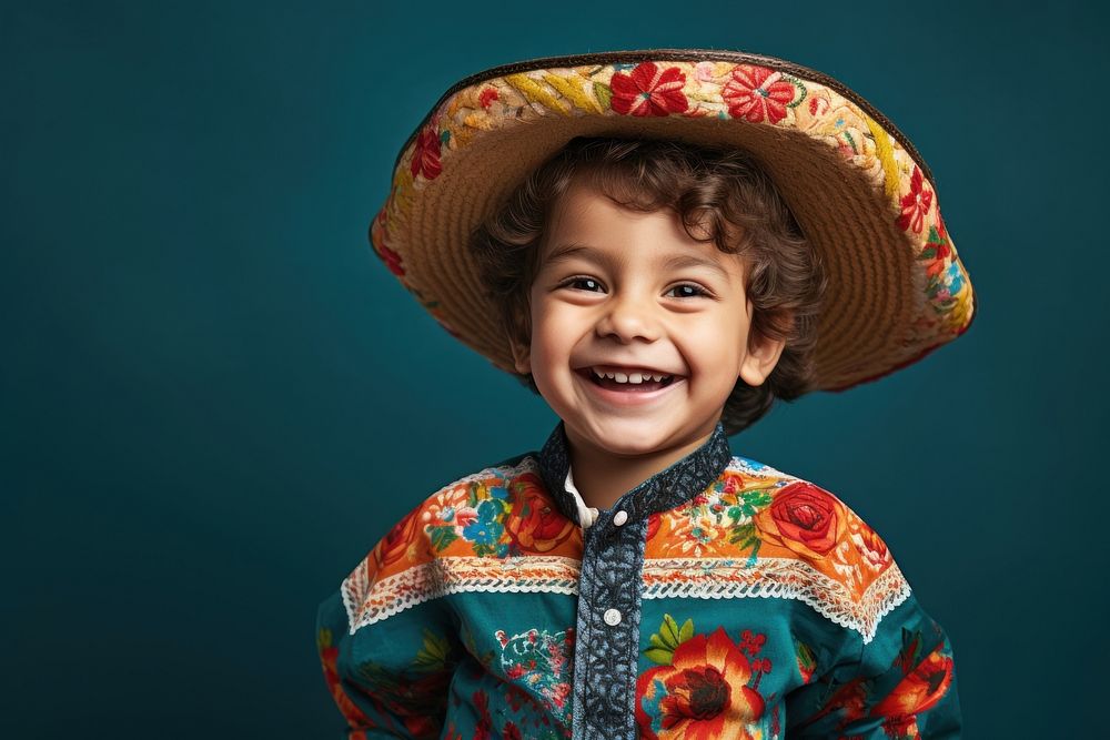 Happy kid in mexican costume portrait laughing smile.