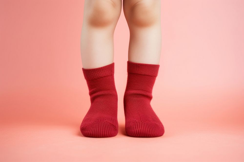 Little legs in sock pantyhose footwear portrait.