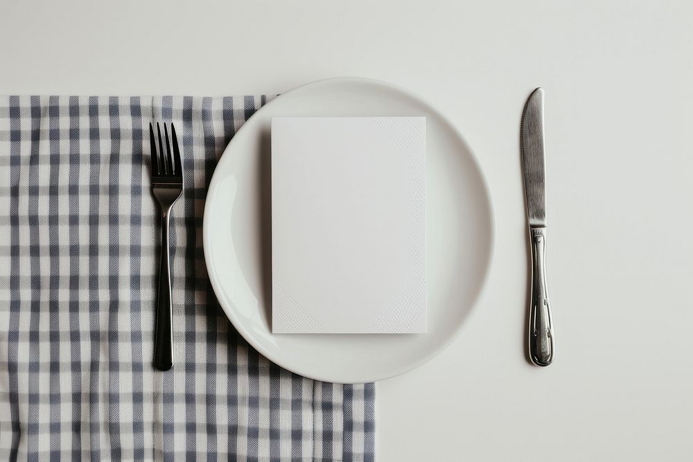 Restaurant menu  napkin plate knife.
