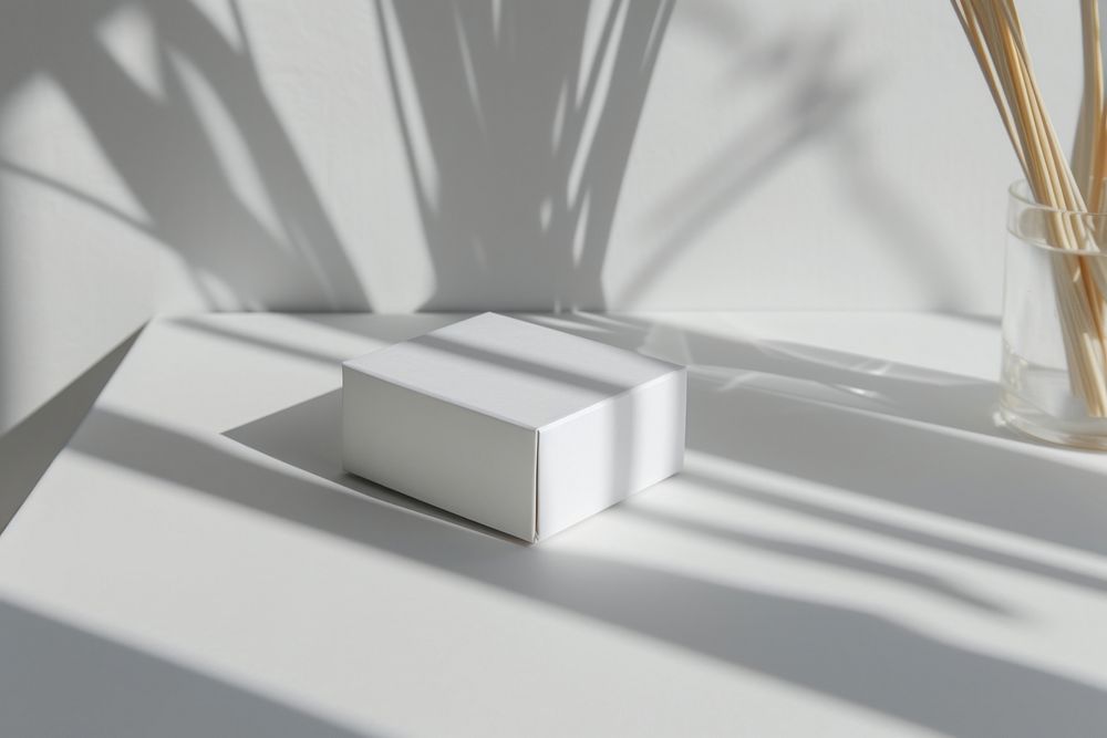 Bamboo cotton buds box packaging  white architecture simplicity.