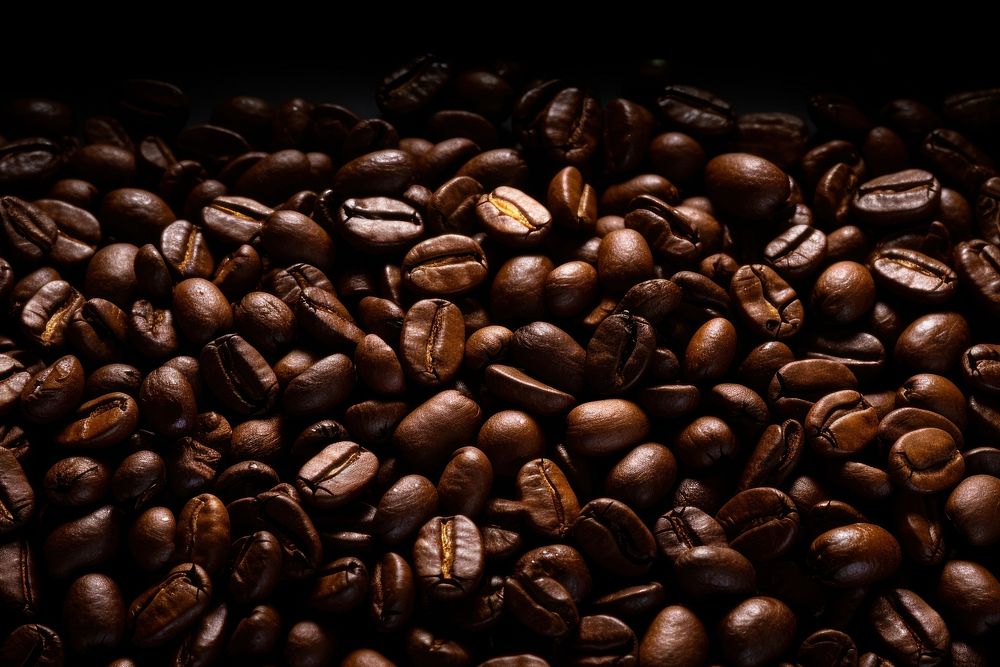 Coffee beans sparkle light glitter backgrounds black food.