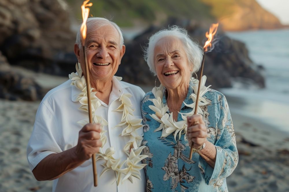 Senior couple portrait smiling holding.