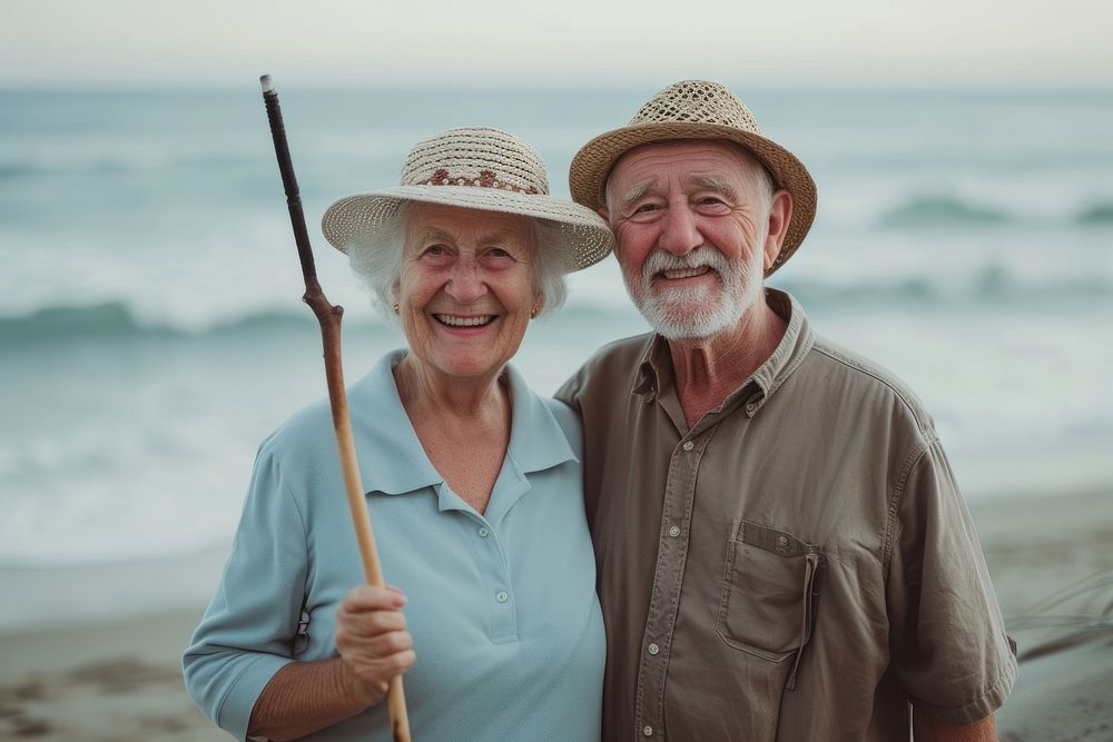 Senior couple beach portrait outdoors.