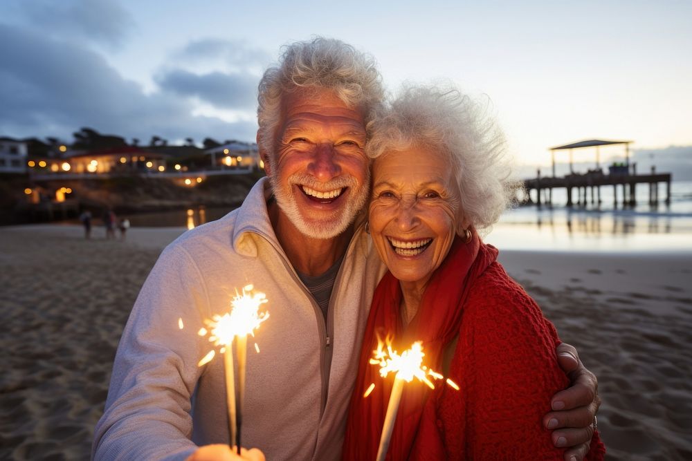 Senior couple beach portrait outdoors.