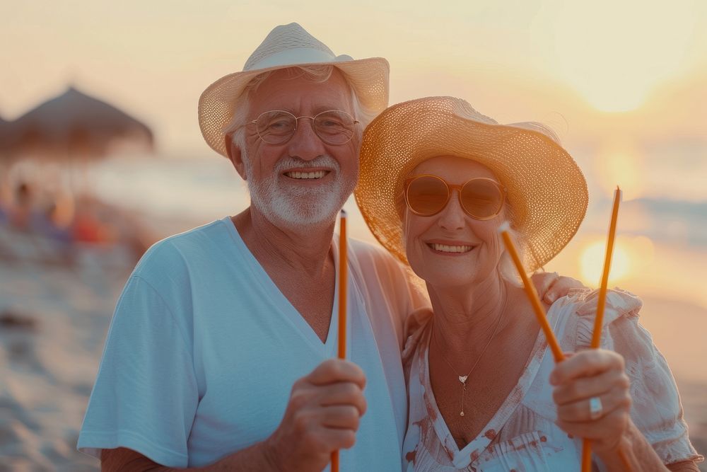 Senior couple outdoors glasses smiling.