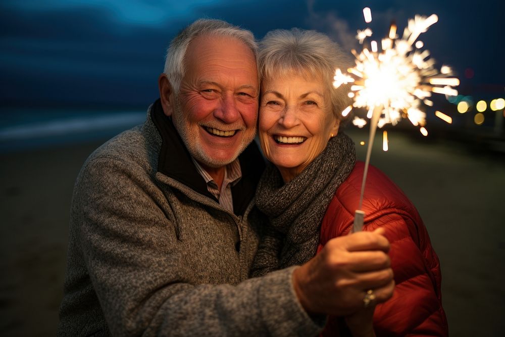 Senior couple laughing portrait outdoors.