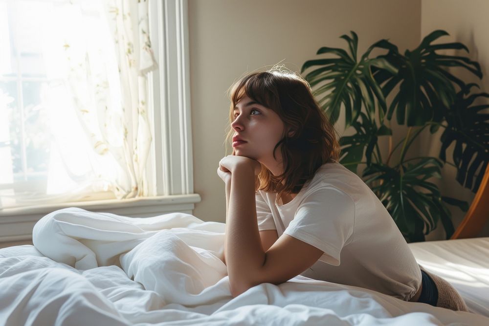 Woman thinking worried bedroom adult.
