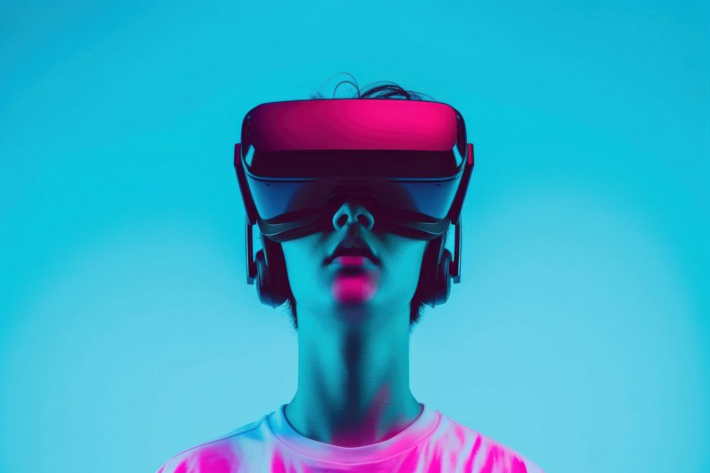 A boy wearing a pair of vr glasses adult accessories technology.
