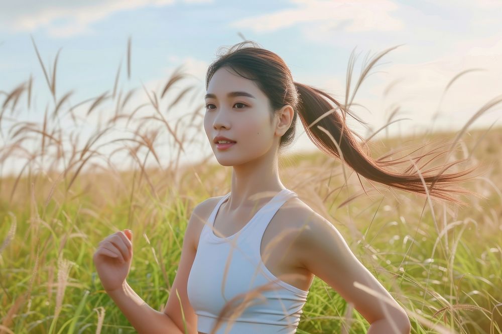 Young woman practicing outdoors running jogging.