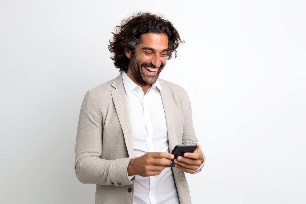 Men holding a phone smile and laugh happy laughing adult photo.