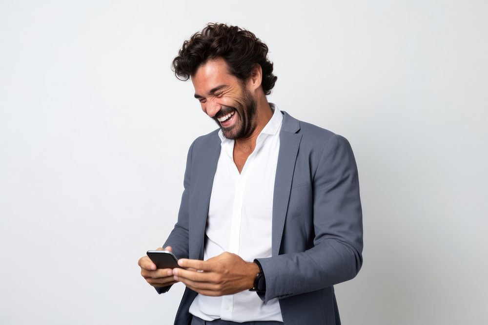 Men holding a phone smile and laugh happy laughing blazer adult.