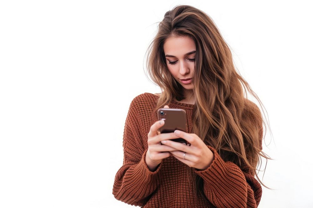 An attractive young woman using a smartphone sweater adult photo.