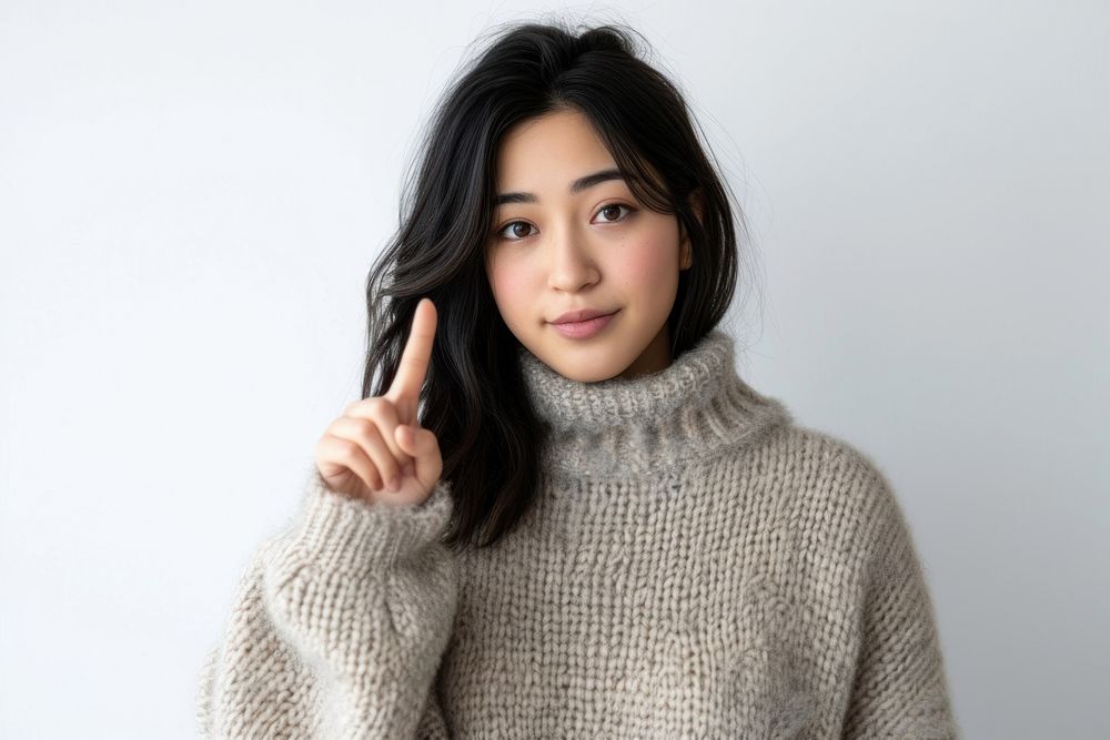Young asian woman sweater portrait photo.