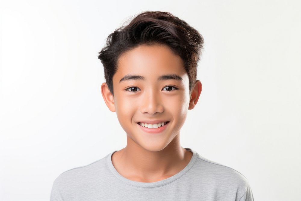 Young teenager Asia boy smiling smile white background studio shot.