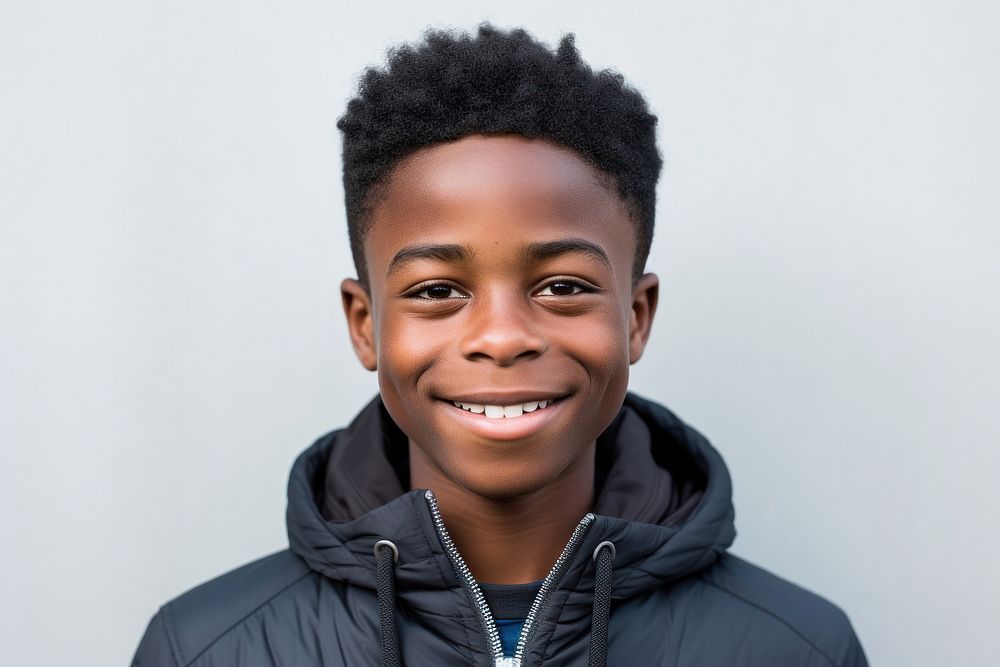 Young teenager black boy smiling portrait smile photo.