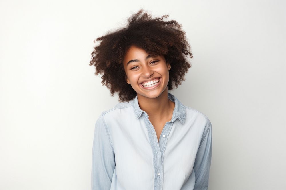 Young teenager black girl smiling portrait smile adult.