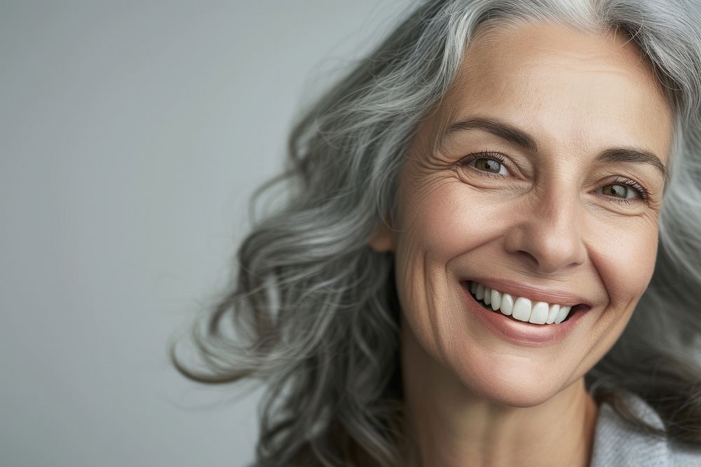 Senior woman portrait laughing smiling.