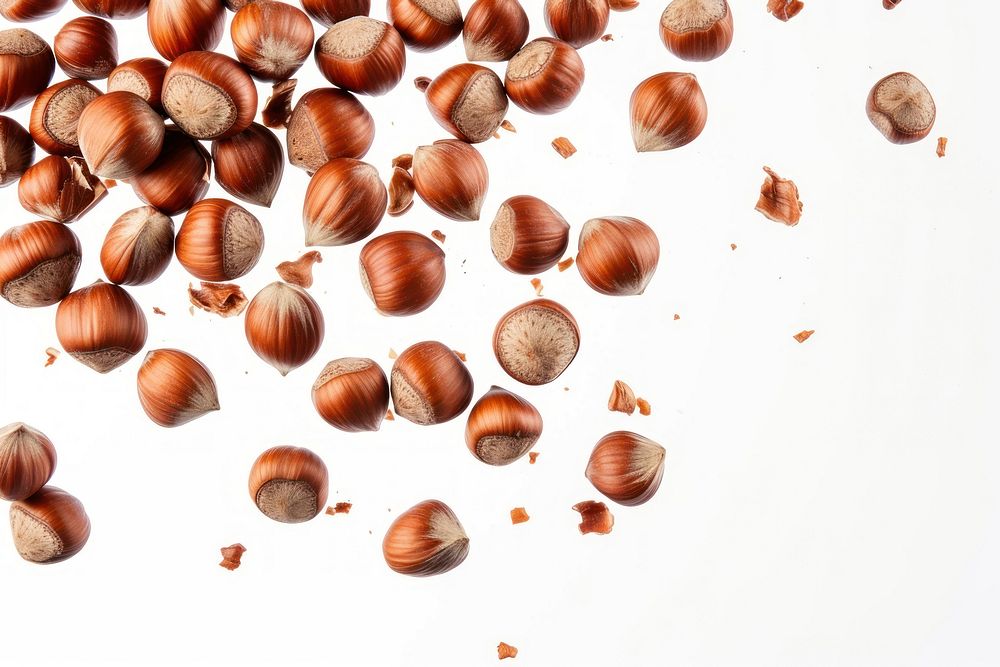 Falling hazelnuts backgrounds food seed.