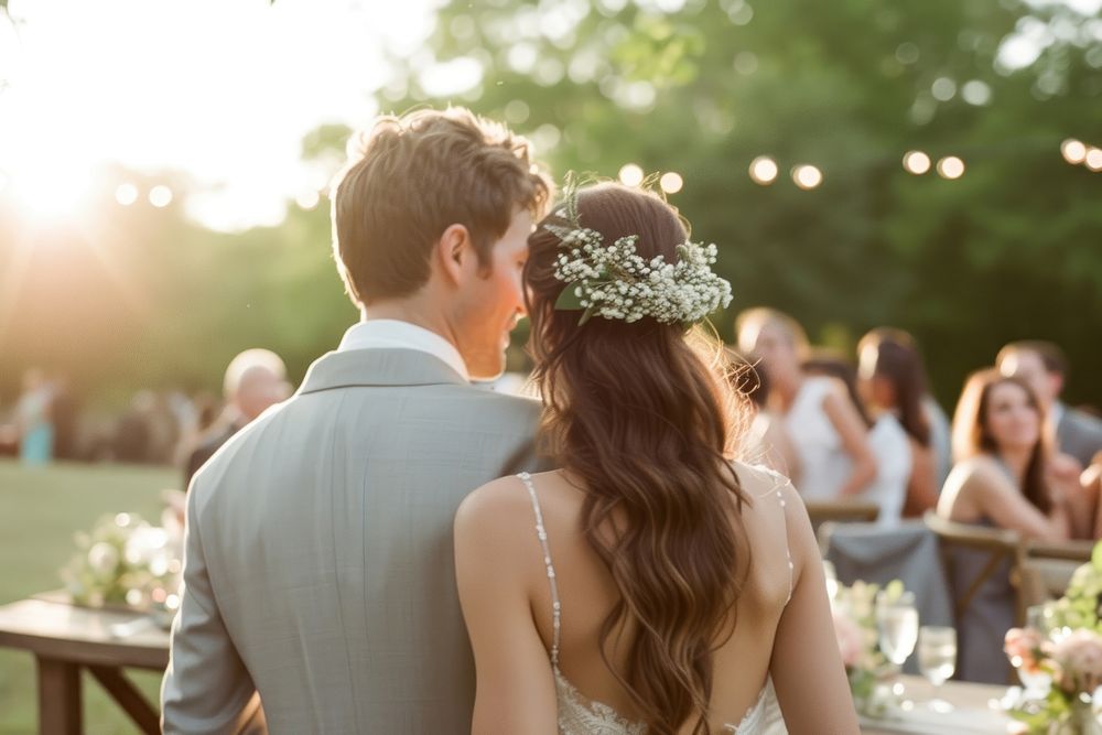 Bride and groom at outdoor wedding party outdoors flower adult.