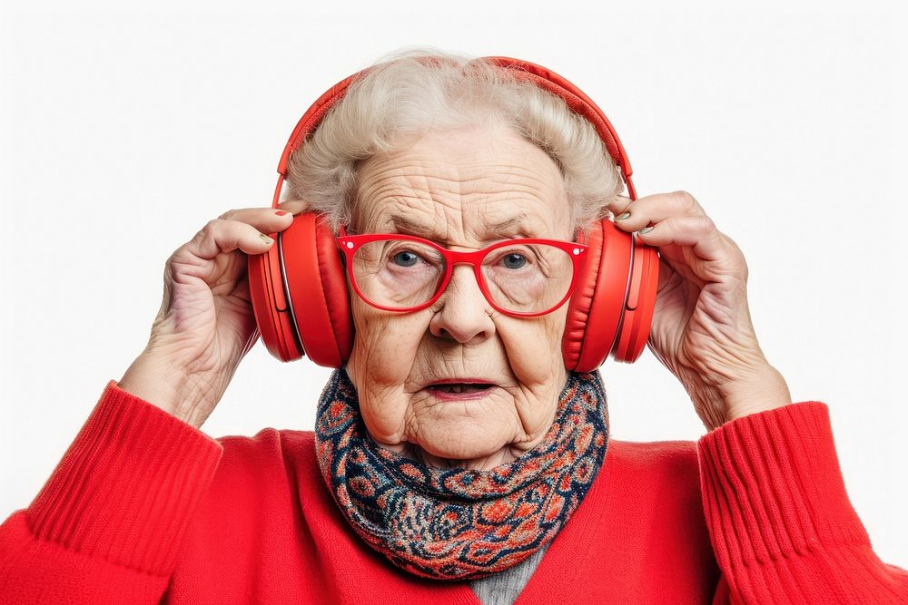Old woman wearing headphones photography portrait white background.