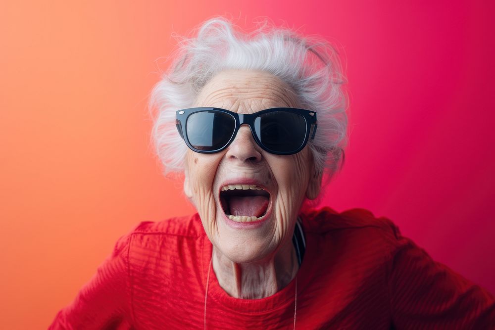 Old woman wearing sunglasses laughing adult accessories.