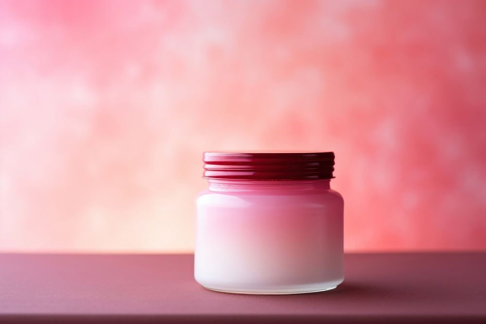 Cream jar pink gradient background red container lighting.