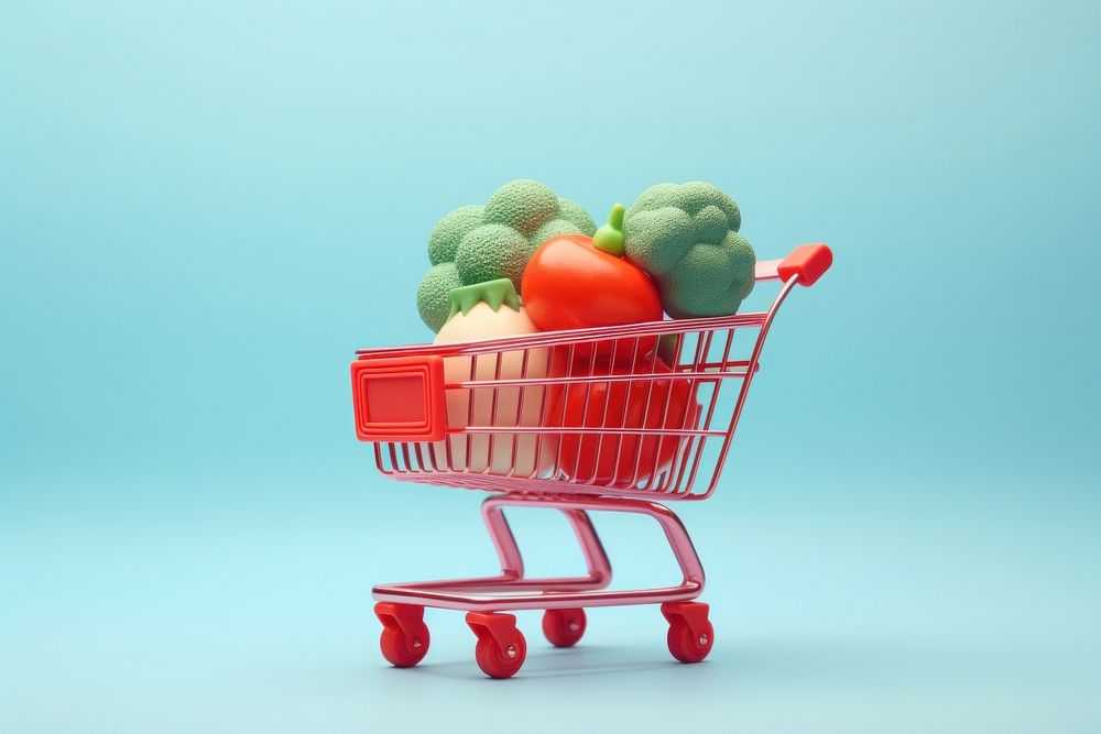 Red shopping cart with vegetables food consumerism supermarket.