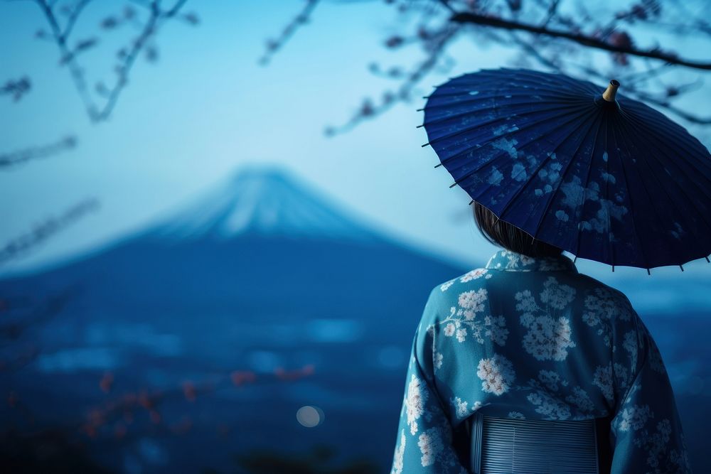 Woman wearing yukata umbrella outdoors kimono.