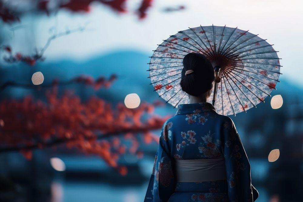 Woman wearing yukata umbrella outdoors kimono.