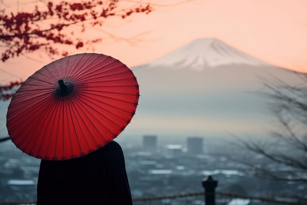 Woman wearing yukata architecture umbrella outdoors.