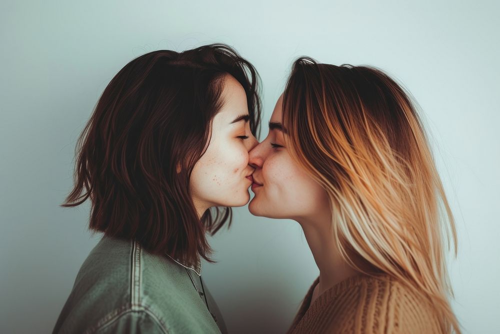 Women couple kissing portrait adult photo.