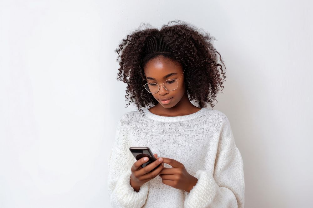 Young african american girl using phone sweater adult white.