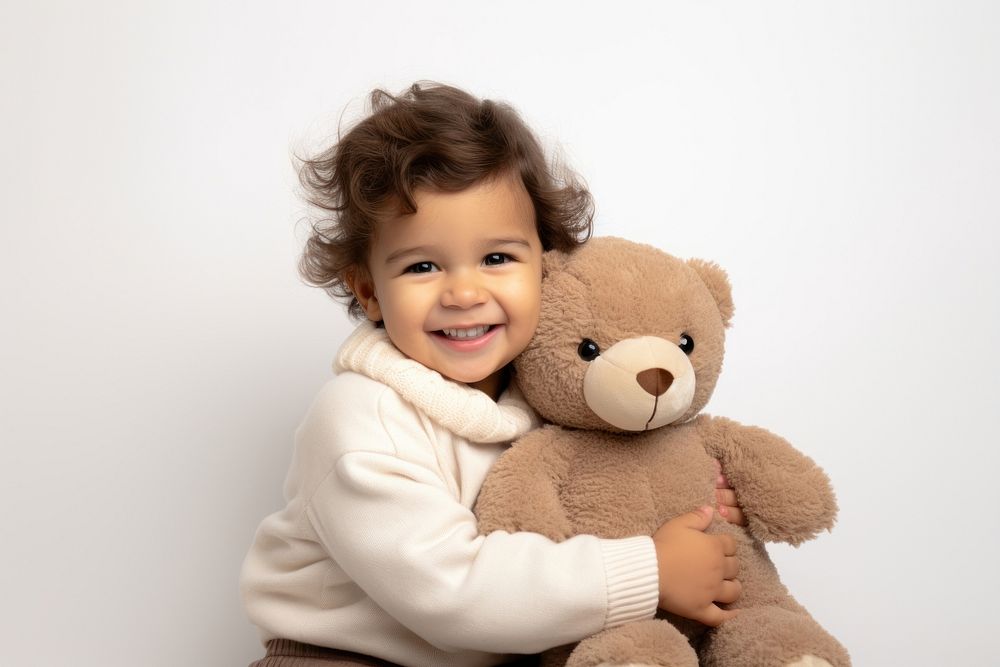 Little boy with teddy bear portrait child smile.