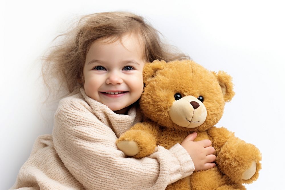 Little girl with teddy bear portrait photo happy.