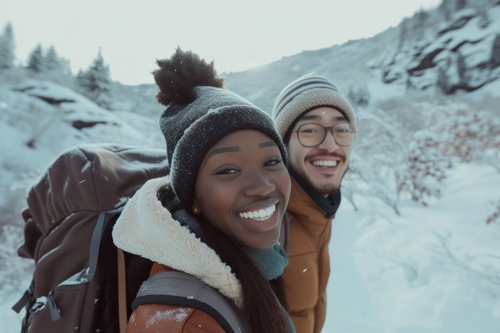 Winter mountains laughing outdoors portrait.