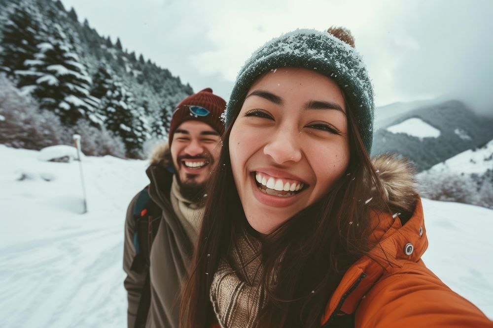 Winter mountains laughing portrait outdoors.