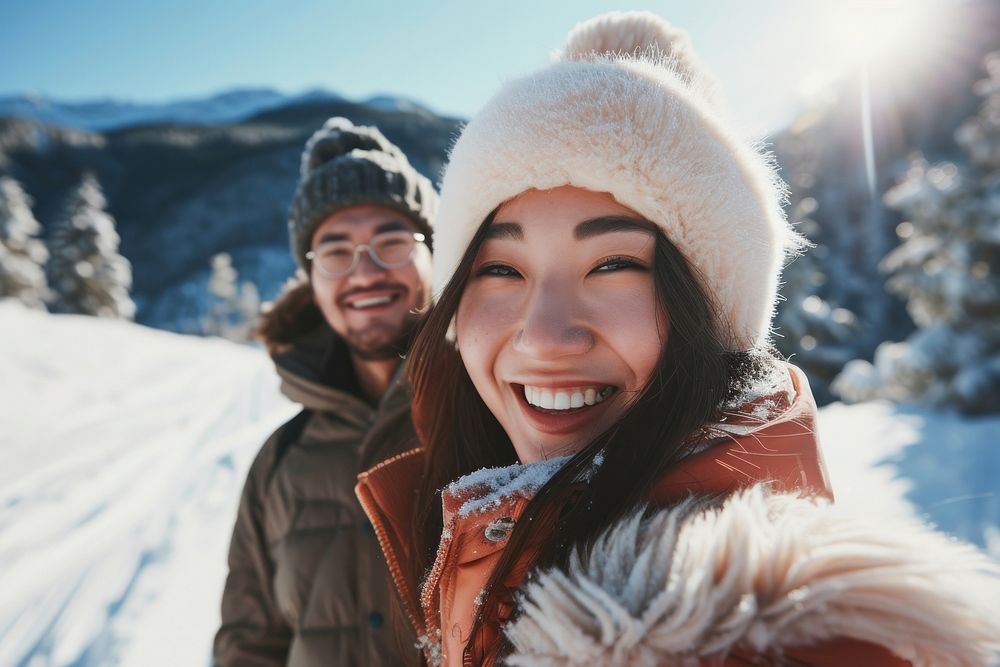 Winter mountains laughing portrait outdoors.