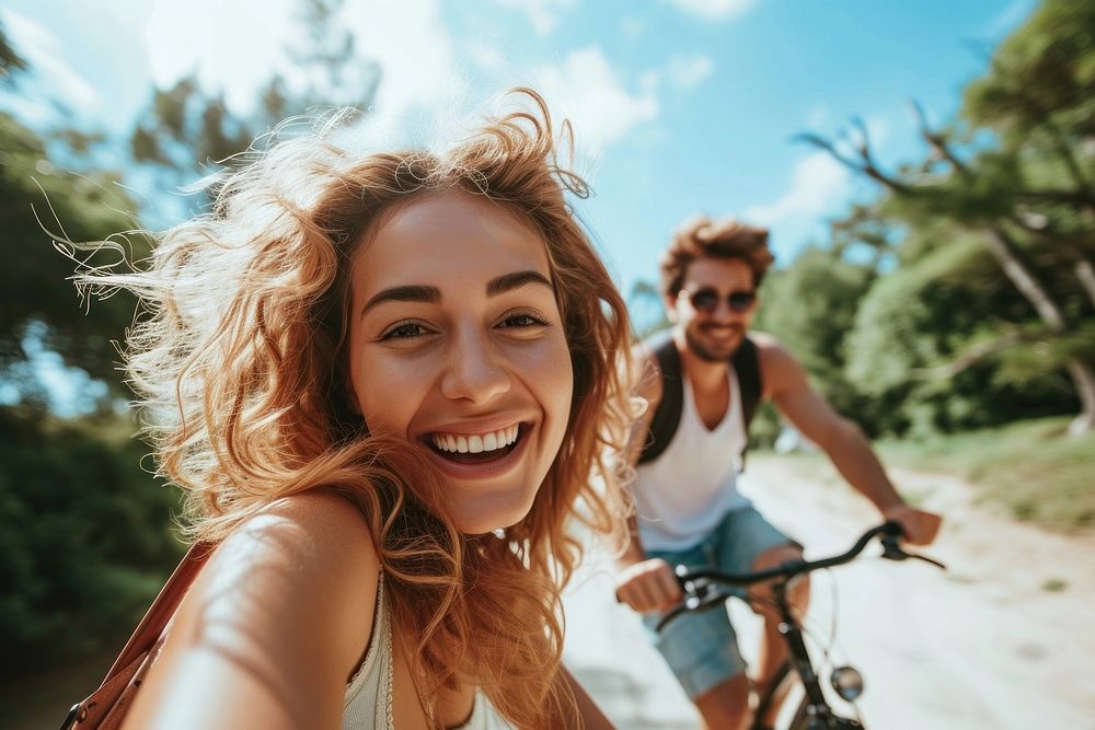 Bicycle rides laughing smiling sports.