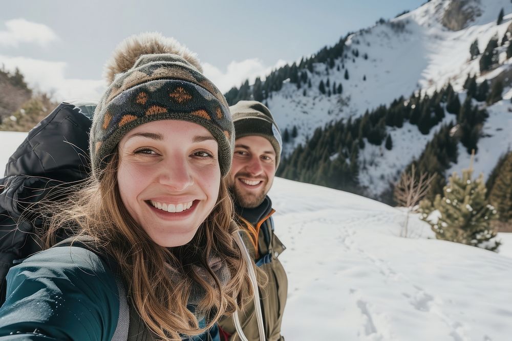 Winter mountains adventure outdoors smiling.