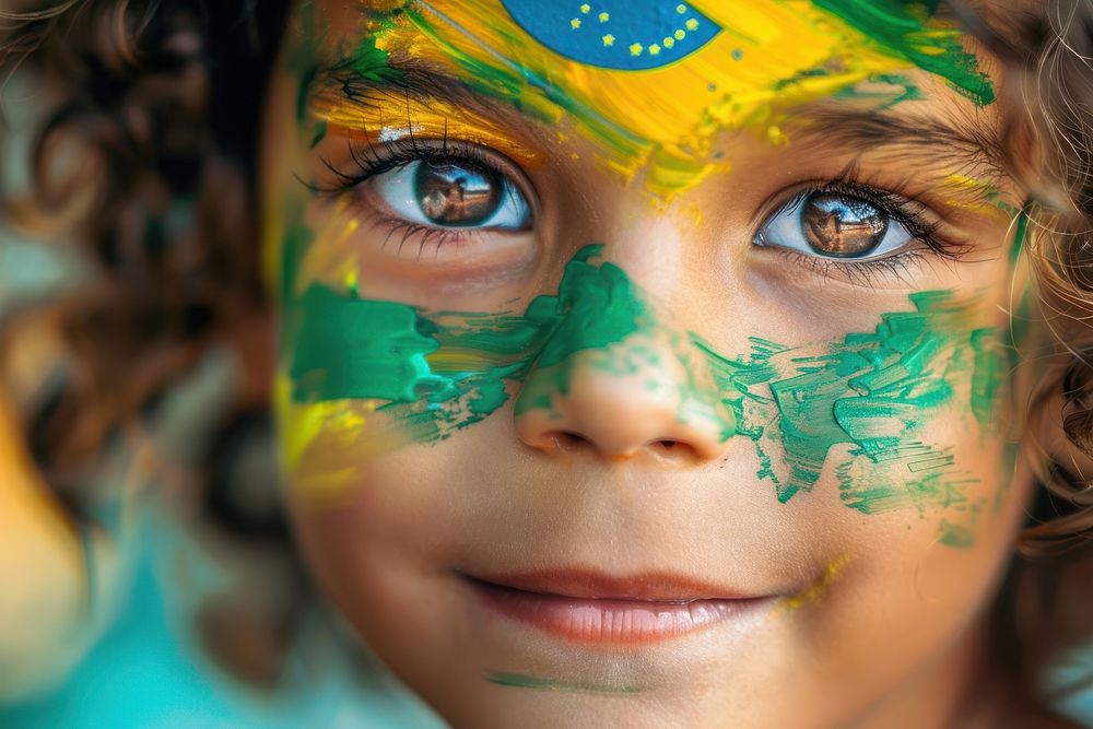 A child with a painted flag Brazilian portrait skin celebration.