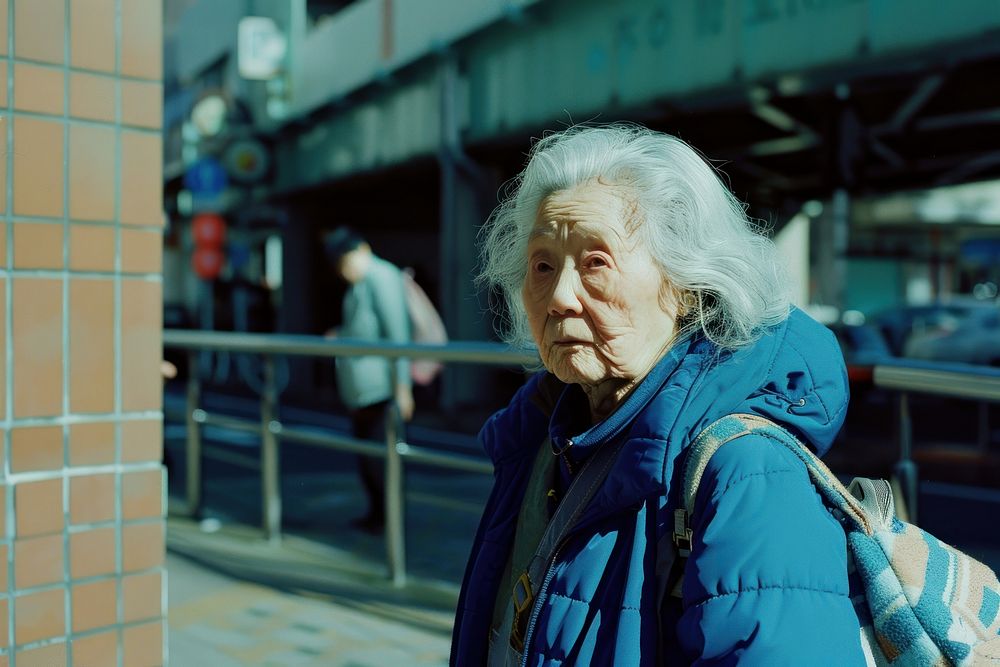 Old woman wearing blue streetwear clothes adult architecture retirement.