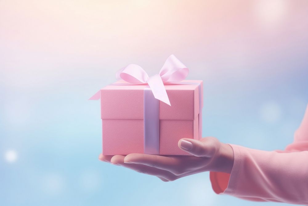 Person holding gifts gradient background pink box celebration.