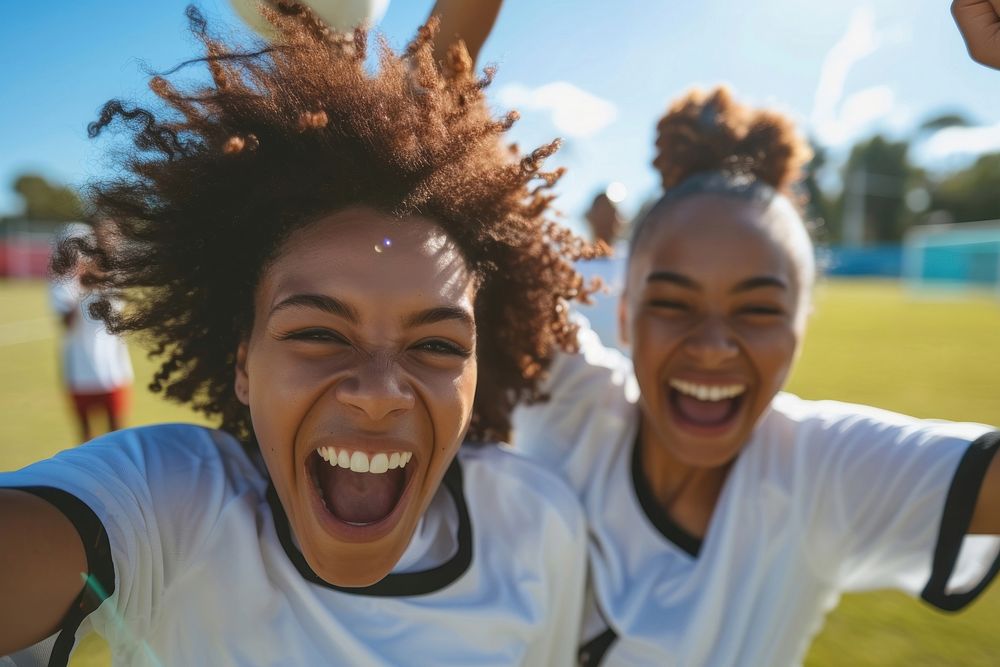 African american female soccer players laughing day togetherness.