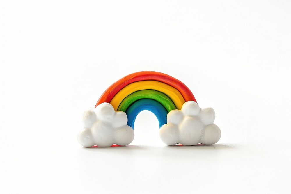 Cloud and rainbow earrings toy white background celebration.