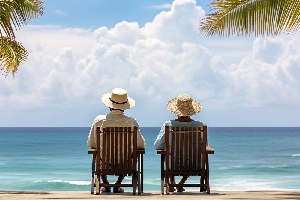 Elderly african american couple chair outdoors vacation.